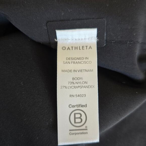 Athleta Interstellar Bike Tunic Top Mock Neck Zip Hem Relaxed Black Women Large - Picture 12 of 13